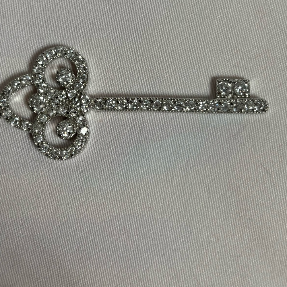 Sterling silver key pendant with cubic zirconia